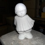 Stenen beeldje meisje